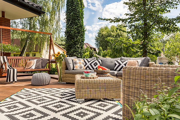 New villa patio idea New design villa patio with comfortable rattan furniture and pattern carpet patio stock pictures, royalty-free photos & images