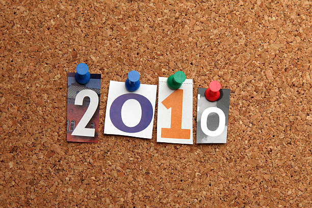New year 2010 pinned on noticeboard 2010 pinned on noticeboard 2010 stock pictures, royalty-free photos & images