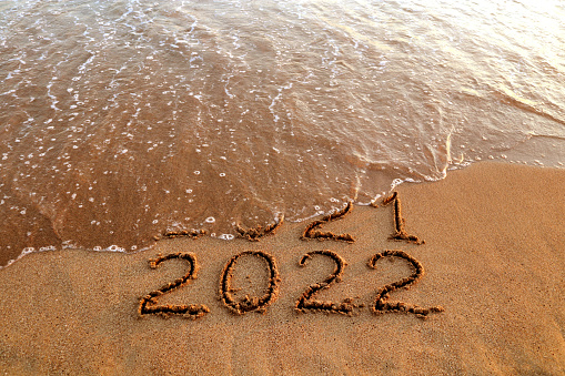new-year-2022-and-2021-on-sandy-beach-wi