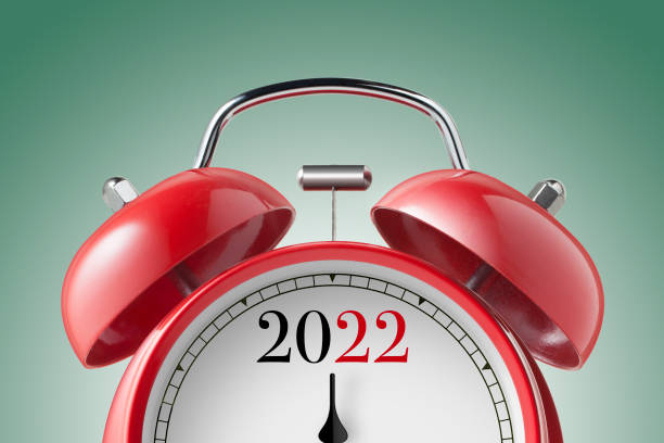 New Year 2022. Close up view of a red alarm clock. stock photo