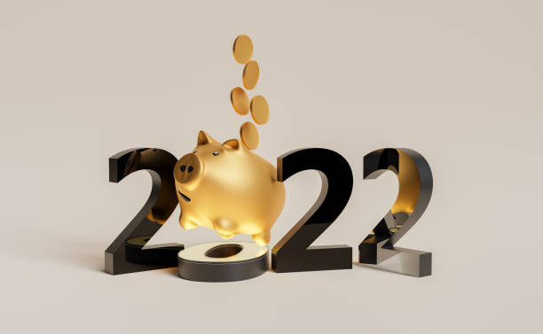new year 2022 with golden piggy bank stock photo