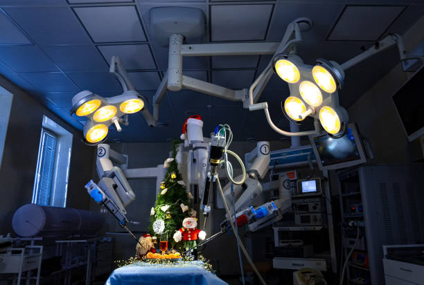 New Year and Christmas in surgery depatment or surgeon. Christmas decorations and balls under surgery lamps. stock photo