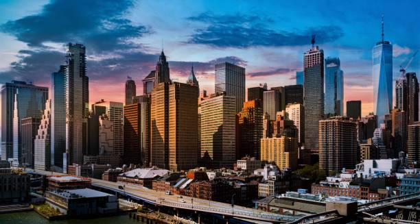 new york vid solnedgången - finanskvarter bildbanksfoton och bilder