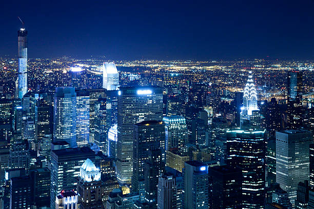 New York City skyline aerial view at night stock photo