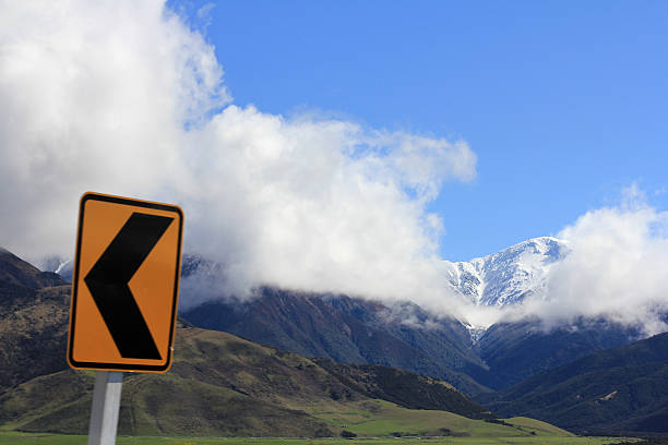 New Zealand Road Sign and Mountains stock photo
