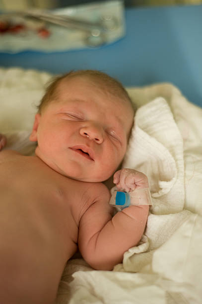 Newborn baby in hospital stock photo