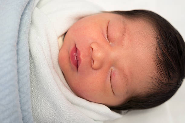 Newborn baby stock photo