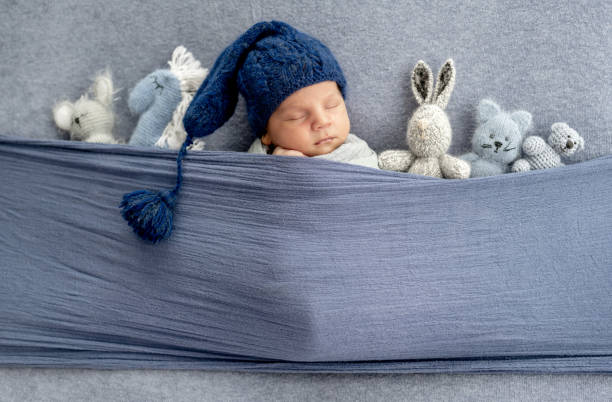 Newborn boy studio portrait stock photo