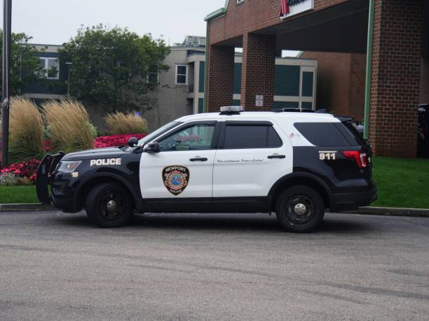 A Newport police car parked across from the Newport Visitors Center. stock photo