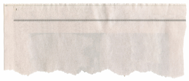 Torn piece of blank newspaper, for background, this one sized for a headline.