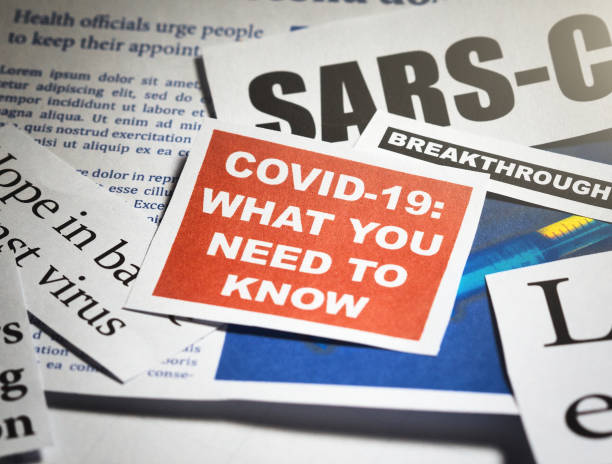 Newspaper headlines during SARS-CoV-2 coronavirus pandemic stock photo