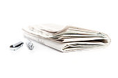 istock newspaper with ballpen 154956522