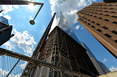istock New-York buildings view from street level  with Freedom Tower in construction 829473494