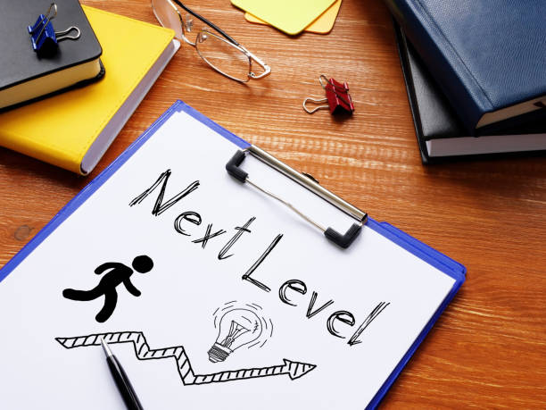 Next level is shown on the business photo using the text stock photo