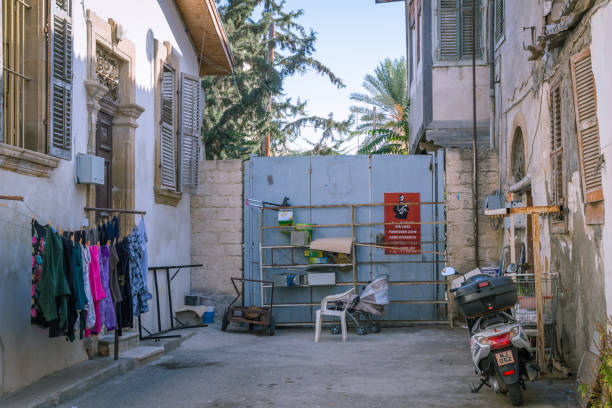 Nicosia buffer zone at Nicosia old city alleys Lefkosa (Nicosia), Cyprus - September 11, 2016: Nicosia buffer zone picture showing the UN buffer zone in Nicosia, taken in September 2016. varosha cyprus stock pictures, royalty-free photos & images