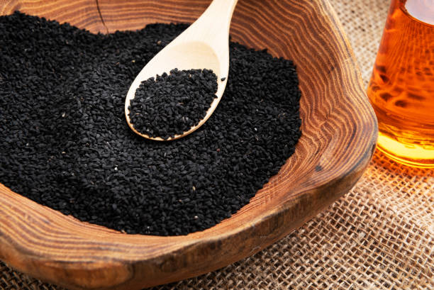 Nigella Nigella seeds and oil cumin stock pictures, royalty-free photos & images