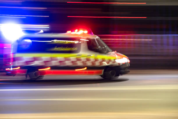 Night Ambulance Ambulance reaching on the Harbour Bridge, Sydney ambulance stock pictures, royalty-free photos & images