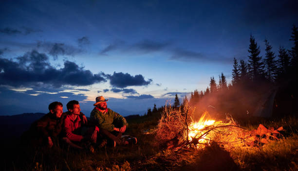 Night camping in the mountains. stock photo