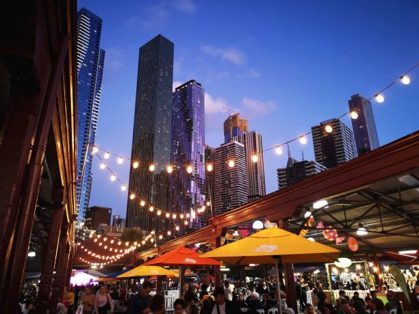Night Food Market - Melbourne Melbourne, Australia: March 05, 2019: Ethnic food is sold at Queen Victoria Market Summer Night Market - every Wednesday throughout the summer season. queen victoria market stock pictures, royalty-free photos & images
