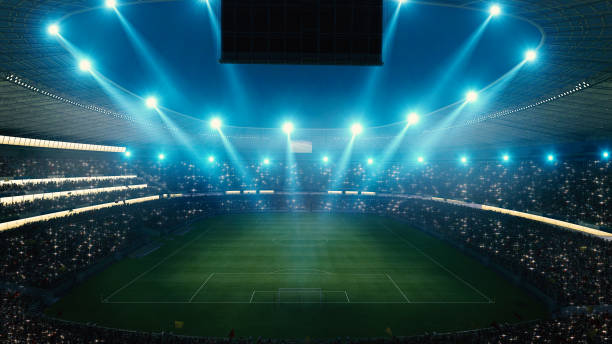 Night football arena in lights close up. soccer stadium. stock photo