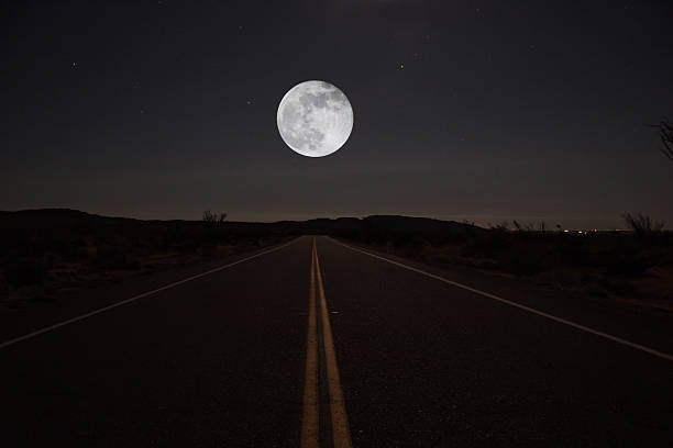 Night Road with Moon stock photo