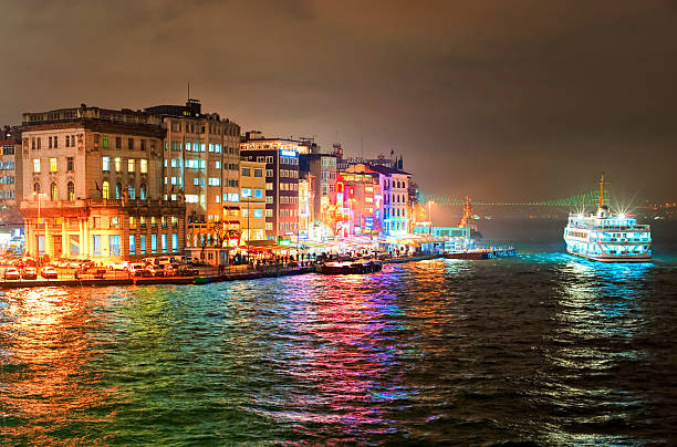 night view of galata quarter on bosporus in istanbul, turkey - karaköy istanbul stockfoto's en -beelden