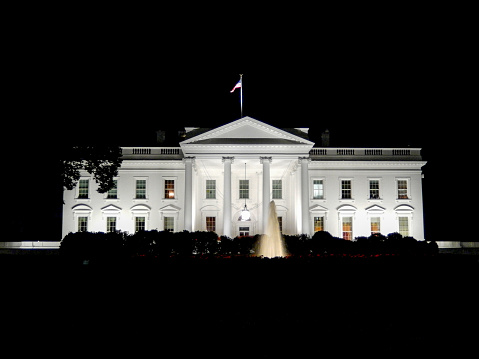 Night view of the White House, the residence of the president of the United States of America, in Washington, DC.