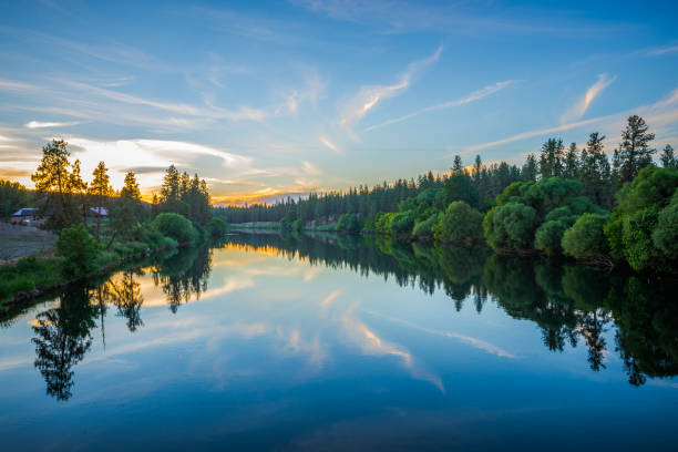 nine mile reservoir on spokane river at sunset stock photo