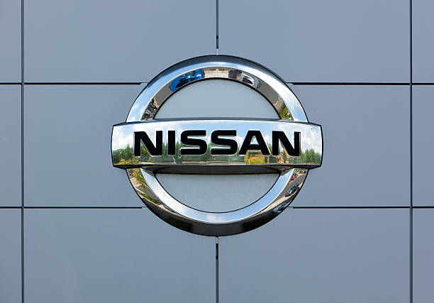 Nissan logo on wall of car dealer's building stock photo