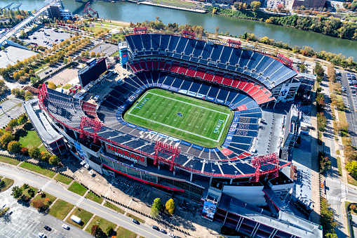 Nashville, United States - November 7, 2020:  Aerial view of the home of NFL's Tennessee Titans; Nissan Stadium located in Nashville Tennessee across the Cumberland River from downtown.