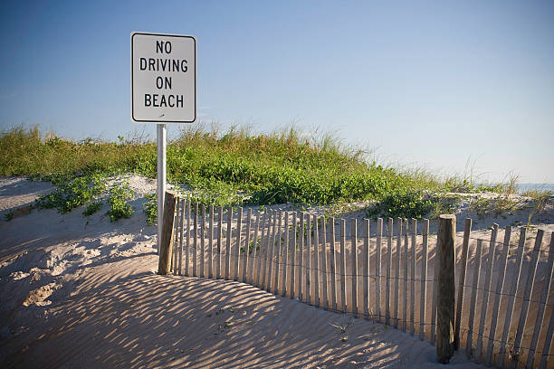 no driving on beach - strandbordjes stockfoto's en -beelden