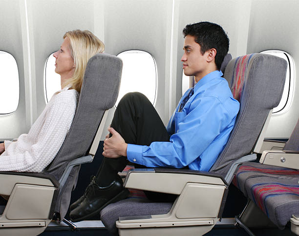 No Leg Room  gchutka stock pictures, royalty-free photos & images