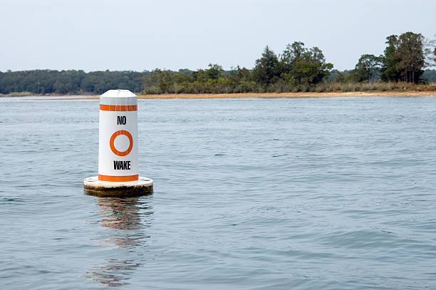 No Wake Buoy No Wake Buoy in Lake theishkid stock pictures, royalty-free photos & images