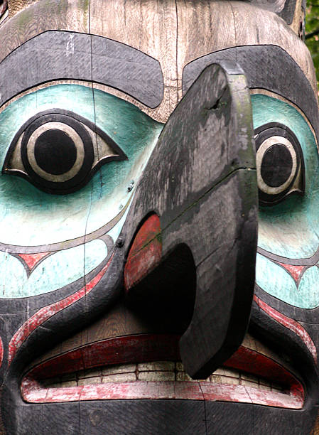 Northwest Native American totem pole face stock photo