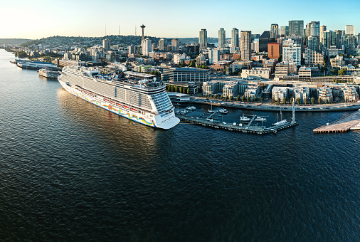 Seattle, USA - July 10th, 2021 The cruise ship Encore of Norwegian Cruise Lines awaits loading at the dock in Seattle.  The ship will be headed to Alaska shortly.