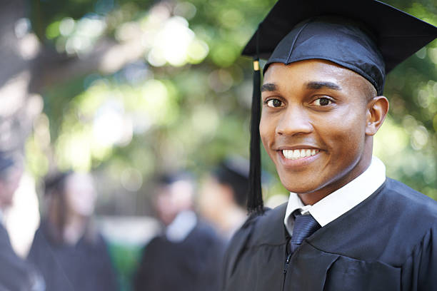 Nothing is going to hold me back! Closeup portrait of a happy male student on graduation dayhttp://195.154.178.81/DATA/i_collage/pi/shoots/783301.jpg campus photos stock pictures, royalty-free photos & images
