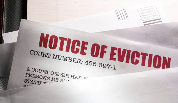 Notice of Eviction mail with protective mask stock photo