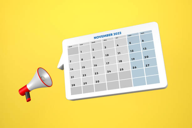 November 2022 Speech Bubble Calendar With Megaphone November 2022 Speech Bubble Calendar With Megaphone On Yellow Background. Time and Calendar Concept. memorial day background stock pictures, royalty-free photos & images