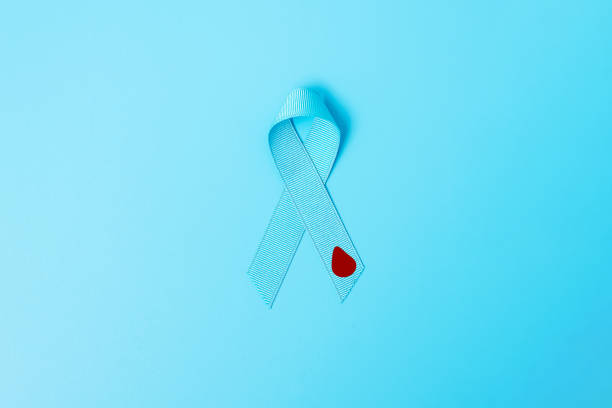November World Diabetes day Awareness month, light Blue Ribbon with red blood drop for supporting people living, prevention and illness. Healthcare, prostate cancer day concept November World Diabetes day Awareness month, light Blue Ribbon with red blood drop for supporting people living, prevention and illness. Healthcare, prostate cancer day concept diabetes awareness month stock pictures, royalty-free photos & images