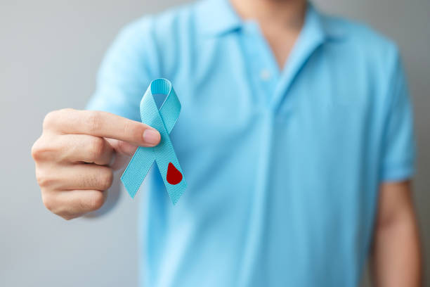 November World Diabetes day Awareness month, man holding light Blue Ribbon with blood drop shape for supporting people living, prevention and illness. Healthcare, prostate cancer day concept November World Diabetes day Awareness month, man holding light Blue Ribbon with blood drop shape for supporting people living, prevention and illness. Healthcare, prostate cancer day concept diabetes awareness month stock pictures, royalty-free photos & images