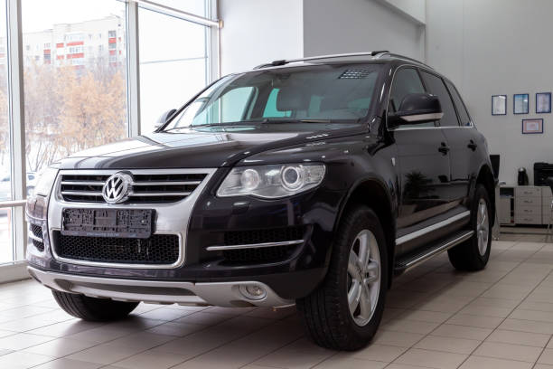 Novosibirsk, Russia - 08.01.2018: Black Volkswagen Touareg 2008 release with an engine of 6 liters W12 front view on the car parking in the service center. Novosibirsk, Russia - 08.01.2018: Black Volkswagen Touareg 2008 release with an engine of 6 liters W12 front view on the car parking in the service center. 2009 stock pictures, royalty-free photos & images