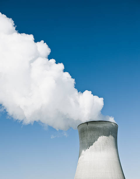 Nuclear Power Station With Steaming Tower stock photo