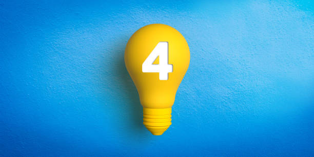Number four. 3D rendered retro type yellow light bulb on blue background. stock photo