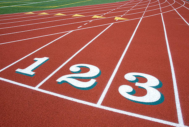 Numbered Lanes at Running Track stock photo
