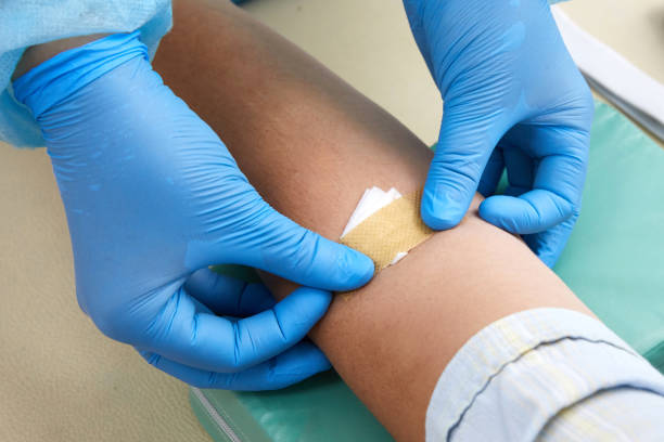 Nurse taking blood sample to make a test in laboratory stock photo