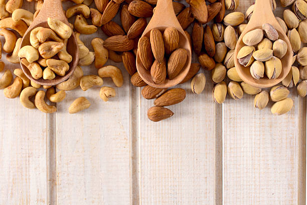 Nuts mix in ladles stock photo