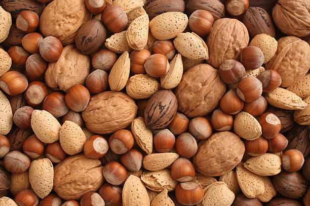 Nuts Variety of nuts nut food stock pictures, royalty-free photos & images