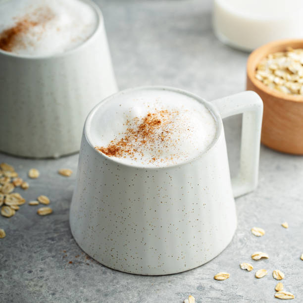 Oat milk latte with thick foam stock photo