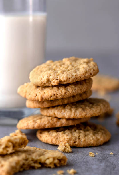 Oatmeal cookies with glass of milk stock photo