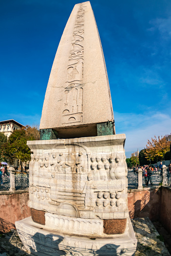 Istanbul, Turkey, November 16, 2019: Obelisk of Theodosius (Dikilitas) with hieroglyphs in Sultanahmet Square, Istanbul, Turkey. Ancient Egyptian obelisk in Istanbul City of Turkey.